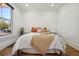 Spacious bedroom with hardwood floors and large windows at 720 Raleigh St, Denver, CO 80204