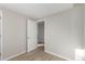 Bedroom featuring neutral walls, light wood floors, and closet at 1050 S Raleigh St, Denver, CO 80219