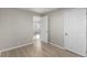 Inviting bedroom features light wood floors, neutral walls, and closet at 1050 S Raleigh St, Denver, CO 80219