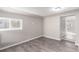 Cozy bedroom with modern flooring and a neutral color scheme, offering a peaceful retreat at 1050 S Raleigh St, Denver, CO 80219