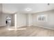 Inviting living room featuring modern flooring and neutral walls, bathed in natural light for a warm and airy feel at 1050 S Raleigh St, Denver, CO 80219