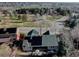 An overhead view highlights a cozy home with solar panels nestled in a Gathering-friendly neighborhood at 7006 S Miller Ct, Littleton, CO 80127