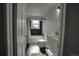 Updated bathroom with modern black tile accents, new vanity, and sleek fixtures at 7006 S Miller Ct, Littleton, CO 80127