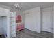 Charming bedroom with a loft bed, large closet, and decorative dresser at 7006 S Miller Ct, Littleton, CO 80127