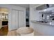 Open concept kitchen area with stainless appliances and lots of cabinetry and countertop space at 7006 S Miller Ct, Littleton, CO 80127
