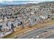 Aerial view of homes showcasing neighborhood and mountain views at 4224 Deer Watch Dr, Castle Rock, CO 80104