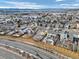 Aerial view of residential neighborhood with houses and landscaping at 4224 Deer Watch Dr, Castle Rock, CO 80104