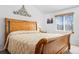 Main bedroom with wood furniture and window at 4224 Deer Watch Dr, Castle Rock, CO 80104