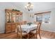 Dining room features hardwood floors and large window at 4224 Deer Watch Dr, Castle Rock, CO 80104