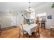 Dining area with hardwood floors and view to kitchen at 4224 Deer Watch Dr, Castle Rock, CO 80104