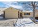 Nice two-story house with attached garage and snow covered yard at 4224 Deer Watch Dr, Castle Rock, CO 80104