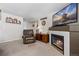 Living room featuring a fireplace and large TV at 4224 Deer Watch Dr, Castle Rock, CO 80104