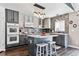 Contemporary kitchen showcasing a center island, sleek countertops, and modern fixtures at 3383 Willowrun Dr, Castle Rock, CO 80109