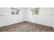 Bright bedroom with neutral walls, a window, and plush carpeting at 1772 S Pierce St, Lakewood, CO 80232