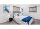 Cozy bedroom with neutral decor, stylish lamps, and comfortable carpeting at 1772 S Pierce St, Lakewood, CO 80232