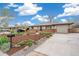 Charming single-story home featuring well-maintained landscaping and inviting curb appeal at 1772 S Pierce St, Lakewood, CO 80232