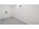 Functional laundry room with painted floor ready for appliances at 1772 S Pierce St, Lakewood, CO 80232