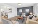 Bright living room with hardwood floors, modern furnishings, and contemporary decor at 1772 S Pierce St, Lakewood, CO 80232
