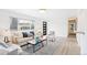 Bright and airy living room featuring modern decor and lots of natural light at 1772 S Pierce St, Lakewood, CO 80232