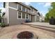 Backyard with an outdoor fire pit and a cozy seating area on a wooden deck at 2828 Shadow Dance Dr, Castle Rock, CO 80109