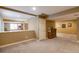 Finished basement area with view to a recreation area and adjacent room at 2828 Shadow Dance Dr, Castle Rock, CO 80109