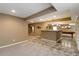 Basement rec room featuring a bar and pool table at 2828 Shadow Dance Dr, Castle Rock, CO 80109