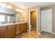 Bathroom with double sinks and an entrance to the water closet at 2828 Shadow Dance Dr, Castle Rock, CO 80109