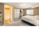 Bedroom featuring closet, full bath and fitness equipment at 2828 Shadow Dance Dr, Castle Rock, CO 80109