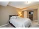 Comfortable bedroom with neutral tones, carpet, and a wooden headboard at 2828 Shadow Dance Dr, Castle Rock, CO 80109
