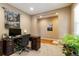 Inviting home office space with natural light and earth tone colors at 2828 Shadow Dance Dr, Castle Rock, CO 80109
