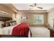 Spacious main bedroom with a ceiling fan and tray ceiling at 2828 Shadow Dance Dr, Castle Rock, CO 80109