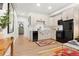 Modern kitchen with light cabinets, black appliances, and stylish flooring at 2121 Hummingbird Way # 102, Georgetown, CO 80444