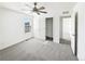 Comfortable bedroom with neutral carpet, ceiling fan, and a closet for organized storage at 4742 Quandary Peak St, Brighton, CO 80601