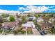 Aerial view showcasing a single-Gathering home with a spacious yard, detached garage, and RV parking at 8110 Ivy St, Commerce City, CO 80022