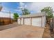 Spacious three-car detached garage offering ample parking and storage space at 8110 Ivy St, Commerce City, CO 80022