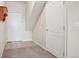 Bright entryway featuring tile flooring, coat closet, and access to the main living areas at 10259 W 55Th Dr # 103, Arvada, CO 80002