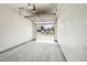 Open garage with ample space for parking, featuring a view of the neighborhood at 10259 W 55Th Dr # 103, Arvada, CO 80002