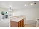 Open layout connecting the kitchen, living room, and patio with views of the outdoors at 10259 W 55Th Dr # 103, Arvada, CO 80002