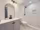Beautiful bathroom features white subway tiles in shower and modern vanity with vessel sink at 6447 St Vrain Ranch Blvd, Longmont, CO 80504
