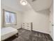 Cozy bedroom with large window, neutral walls, and plush carpet, creating a serene and inviting atmosphere at 6447 St Vrain Ranch Blvd, Longmont, CO 80504