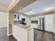 Modern kitchen with white cabinetry, stainless steel appliances, and granite countertops at 6447 St Vrain Ranch Blvd, Longmont, CO 80504