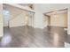 Spacious living room with hardwood floors and an open floor plan, perfect for entertaining at 6447 St Vrain Ranch Blvd, Longmont, CO 80504