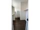 Walk-in closet with hardwood floors, shelving and hanging rods at 6447 St Vrain Ranch Blvd, Longmont, CO 80504