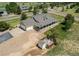 Spacious home with an attached garage, shed, and outdoor patio area providing ample storage and entertaining space at 895 Antelope W Dr, Bennett, CO 80102