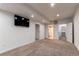 Finished basement area with recessed lighting, and ample space for entertaining at 895 Antelope W Dr, Bennett, CO 80102