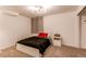 Modern bedroom featuring an accent pillow, a night stand and plush carpet at 895 Antelope W Dr, Bennett, CO 80102