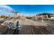 View of community park featuring playground equipment, picnic area, and walking paths at 895 Antelope W Dr, Bennett, CO 80102