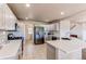 Modern kitchen with stainless steel appliances and quartz countertops at 895 Antelope W Dr, Bennett, CO 80102