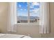 Mountain view visible from the bedroom's large bright window at 1062 Rockhurst Dr # 401, Highlands Ranch, CO 80129