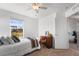 Bright bedroom with vintage desk, and bright window that provides natural light at 6310 S Ider St, Aurora, CO 80016